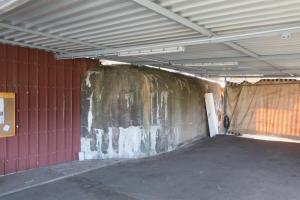 Ligne Maginot - Casemate de Hatten Sud - La casemate a quasiment disparue suite à l'extension de la buvette du stade voisin, seule la cloche émerge encore