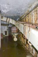 Ligne Maginot - ROCHONVILLERS - A8 - (Ouvrage d'artillerie) - Bloc 5
Étage inférieur du bloc
Le convoyeur à rouleaux permettant l'évacuation des douilles